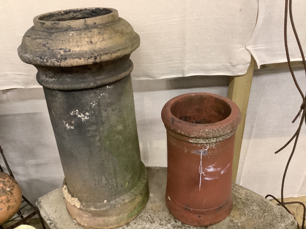 Two pottery chimney pots, larger 76cm high